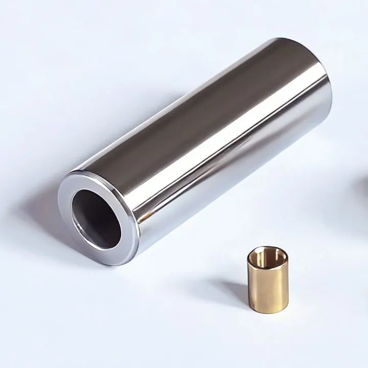 Long silver-coloured sleeve and small gold-coloured bushing