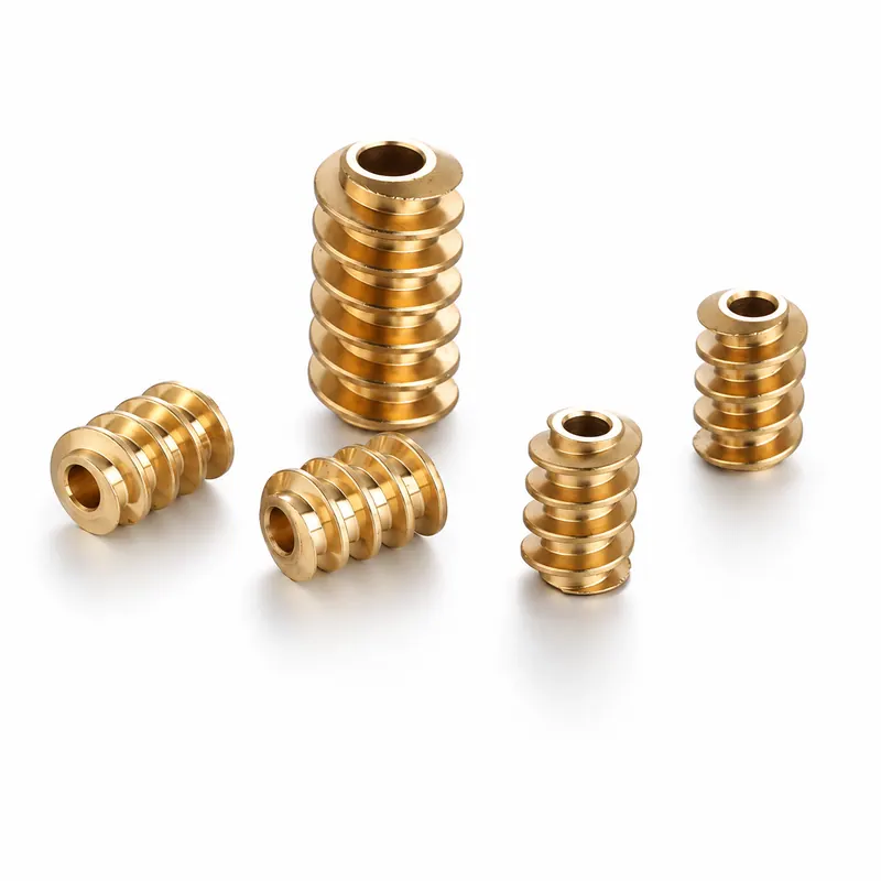 Gold- and silver-coloured CNC turned parts