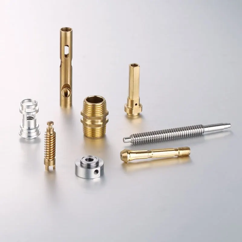 Assorted gold- and silver-coloured turned parts